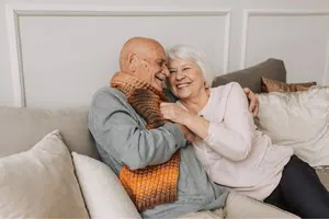 Elderlymanandwomanembraced300x200